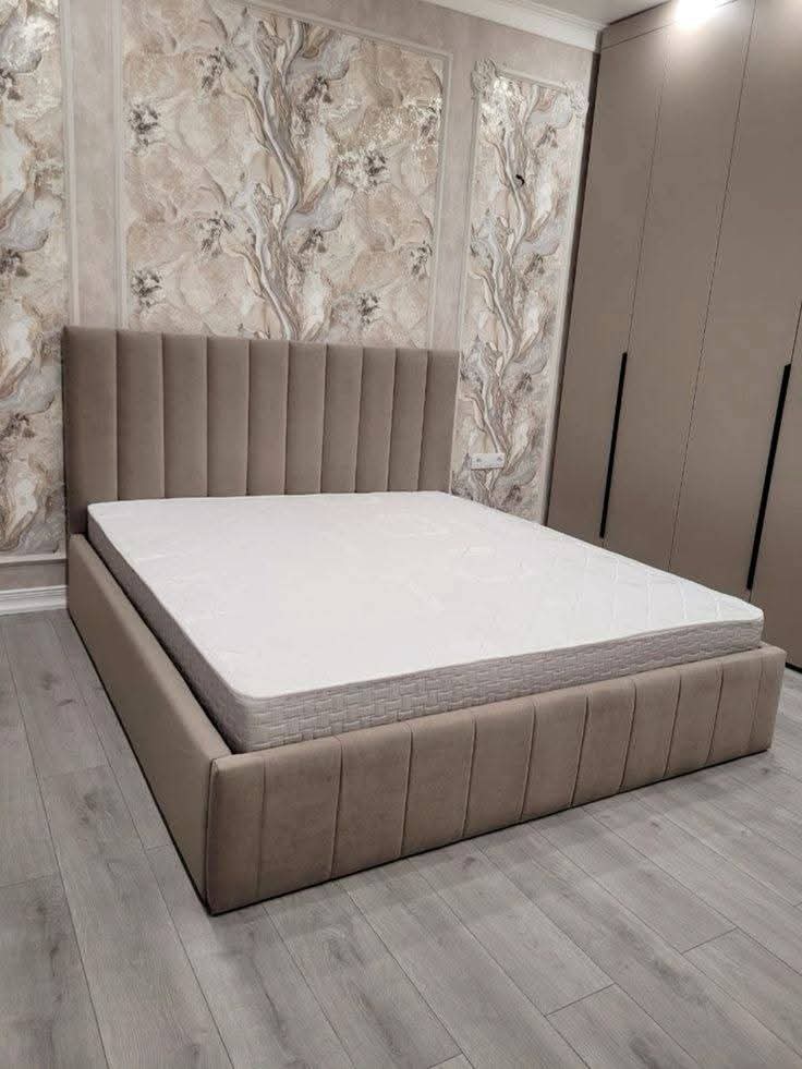 Beige upholstered bed